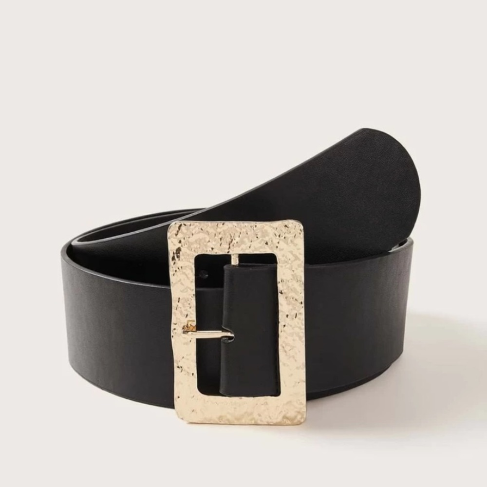 Black waist belt with large gold buckle